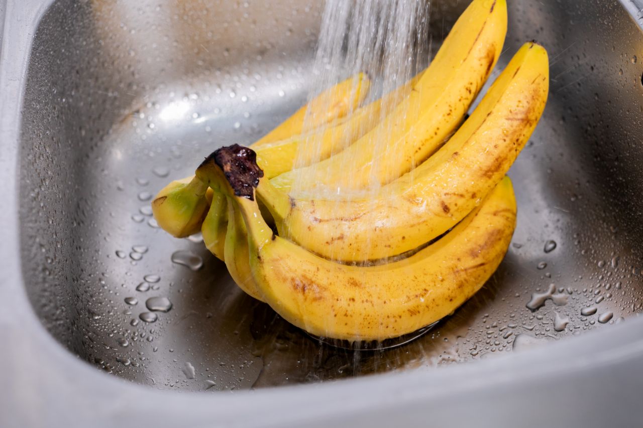 ripe bananas being washed