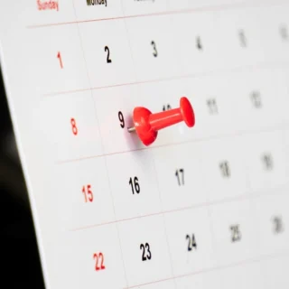 Important day with red pin on calendar